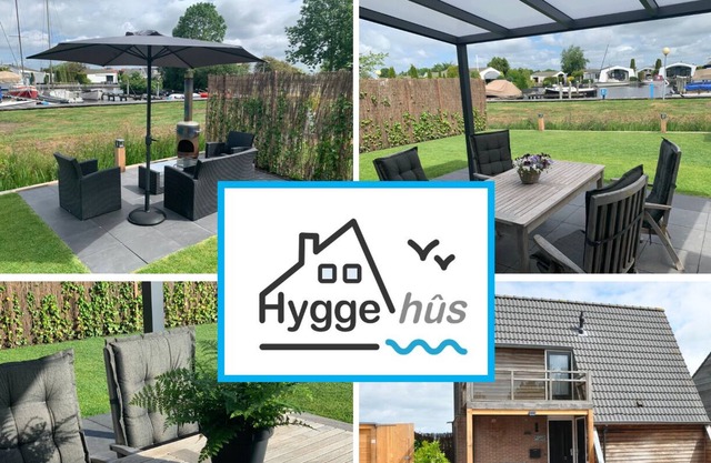 Luxury holiday home with air conditioning, sauna, boats at private harbor.