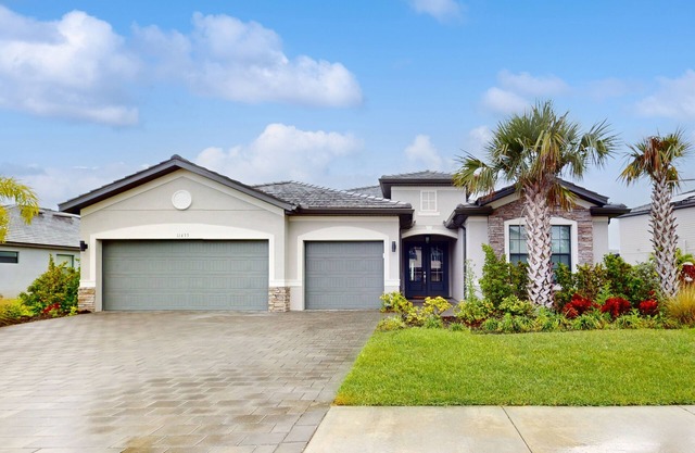 Luxury lake view home with pool, hot tub, athletic courts, & gym - dog-friendly