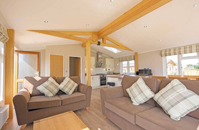 Luxury lodge with one double with en suite shower and one twin.