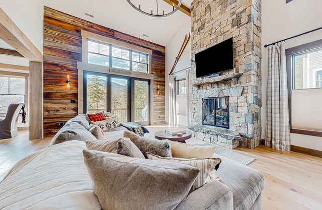 Luxury mountain home with fireplace, children's items, & expansive outdoor space