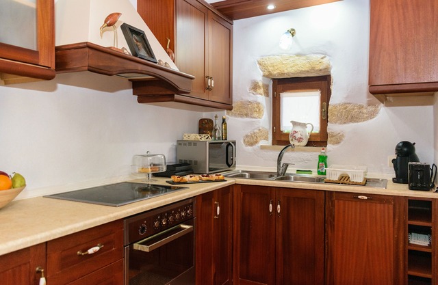 Luxury stone villa with outdoor jacuzzi, private pool and antique furniture
