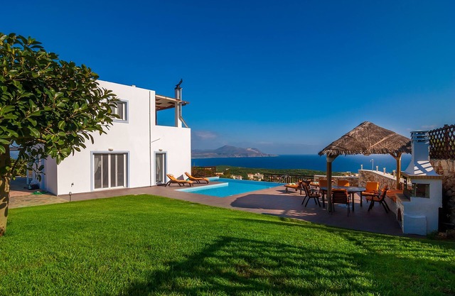 Luxury villa overlooking the Canyon backgrounded by Blue Sea