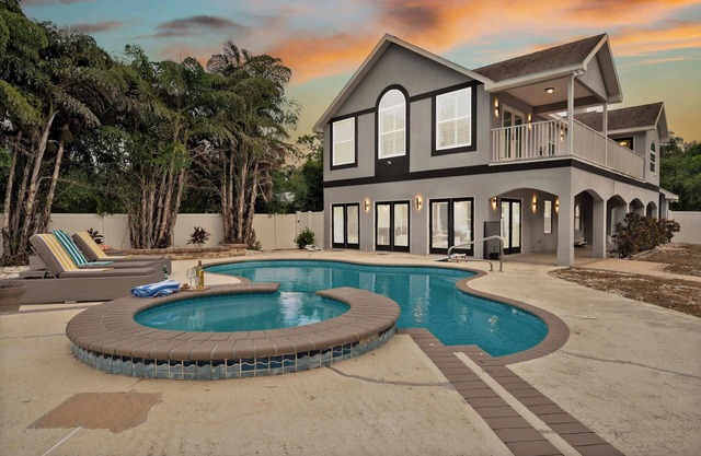 Luxury Villa| Waterfront + Heated Pool & Game Room