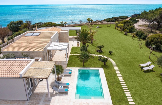 Luxury villa with pool, beach front, Porto Ulisse