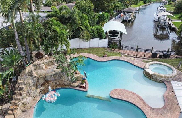 Luxury Waterfront Home w Pool HotTub and Waterslide. Off McGregor near Beaches