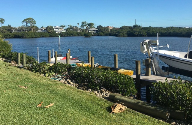 Mid-century Waterfront Home with heated pool