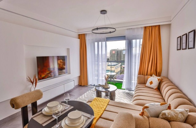 Modern 1-Bed Apt 2-min Walk to Junction Mall Pool & Gym