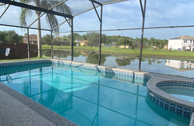 Modern 5 bedroom villa with private pool/lake view/30 mins from Disney