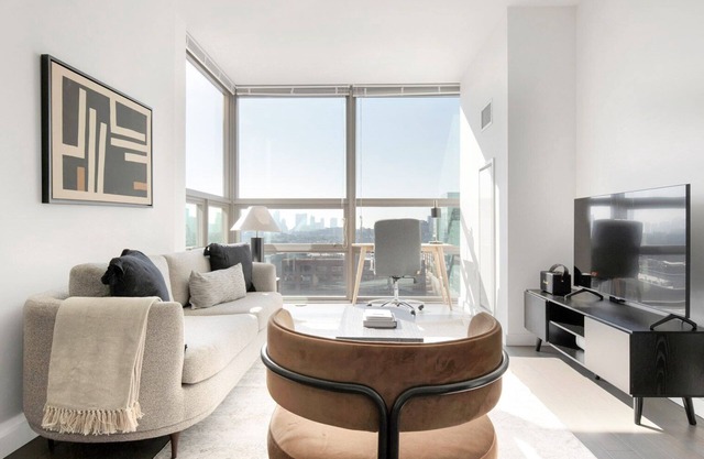 Modern Hoboken 2BR w/Doorman, Gym & W/D, near shuttle, by Blueground