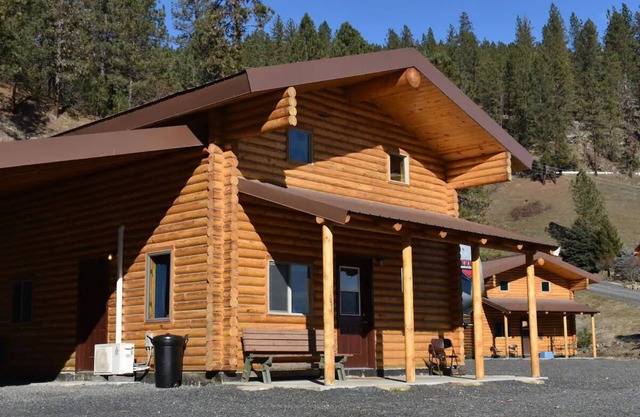 Modern log cabin with a cozy cabin feel along the Clearwater River.