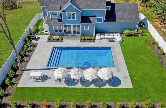 Modern, new 4-bedroom with private beach, heated pool and all the amenities