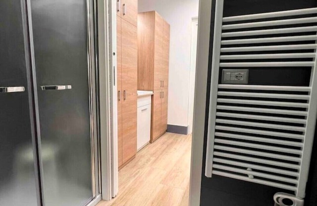 Modern oasis. 1 minute walk to the beach. A/C