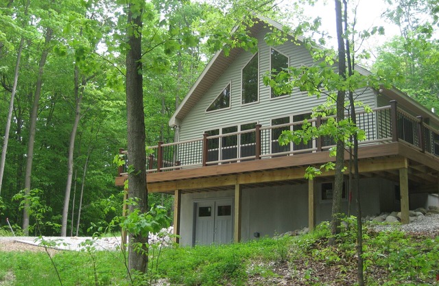 Modern, secluded house with Crystal Lake views on a forested ridge