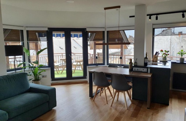 Modern top floor loft with balcony