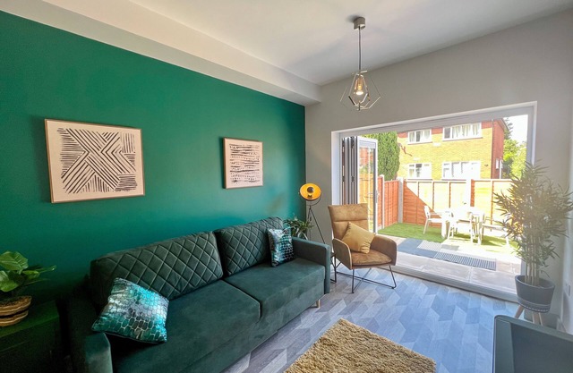 Modern two bed house with drive and EV parking.