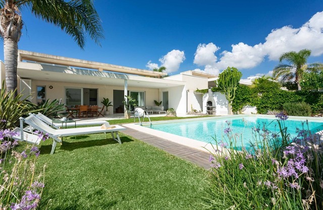 modern villa with pool near the center/sea