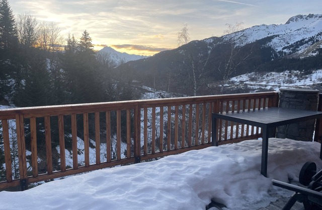 Mountain chalet at the foot of the ski slopes - resort center with parking lots