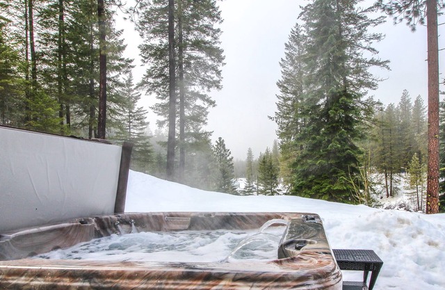 Mountain-view hideaway with hot tub, patio, deck, & outdoor firepit