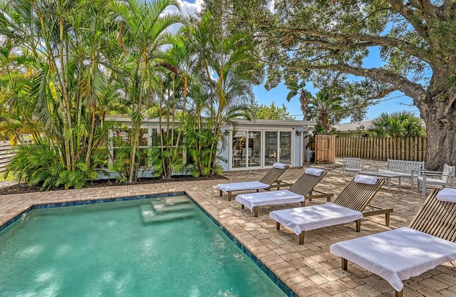 Near Siesta Key Beach, this Boho chic Sarasota pool home will feel like an oasis