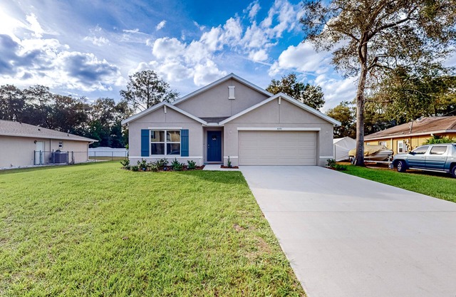 New home with large yard, covered patio, grill, central AC, & W/D