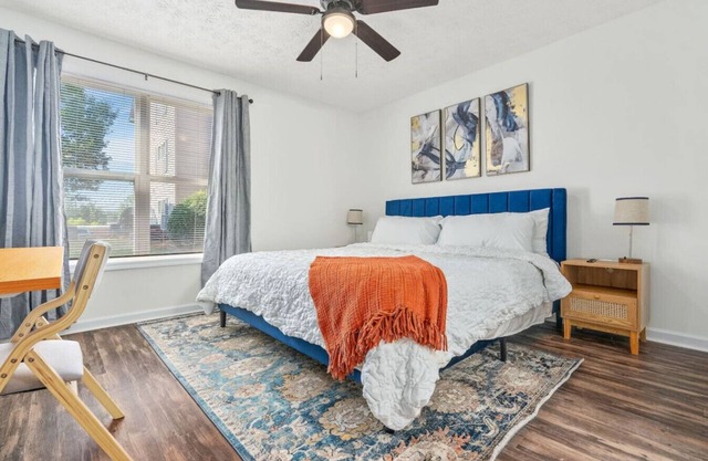 New King Bedroom inside a 4 BR Condo 2 Mins to Downtown & Stadium