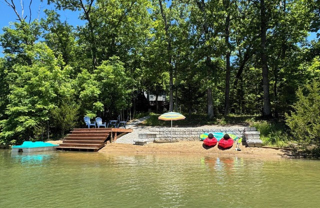 ! NEW LISTING! Lakefront Chalet with Private Beach on Beautiful Clear Water!