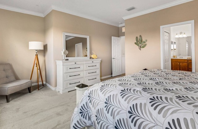 Newer 2022 Immaculate 4/2.5 Townhome Lake View in Resort Style Community