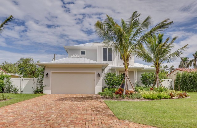 Newer Island Style Home with Salt Water Pool