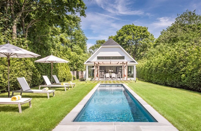 Newly constructed contemporary home, gunite heated pool, hot tub, deck with.
