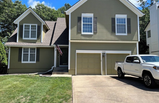 Newly listed 4 bedroom home with 2 car garage in great location