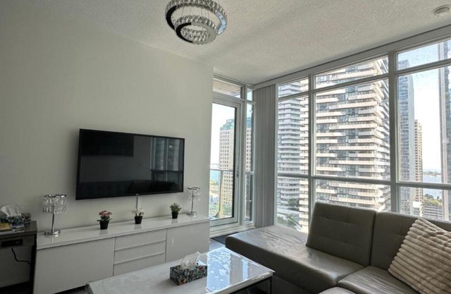 Newly updated 2BR, 2Bath & Den in Downtown Toronto beside Union Station & Scotia Bank Arena!