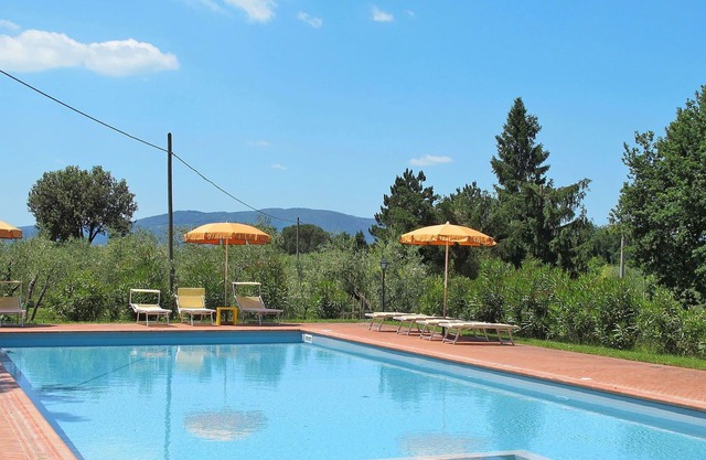 Nice apartment in villa for 3 guests with pool, WIFI, TV, patio and parking