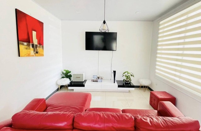 Nice house 15 from the airport great rooftop view in heredia , 24/7 security….