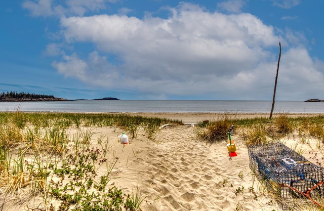 Ocean front cottage with 125 feet of private beach frontage
