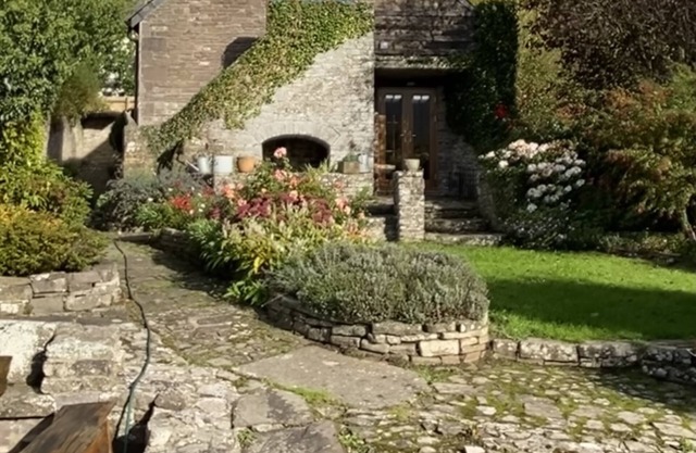 Old Coach House with stunning views over the Brecon Beacons. Sleeps 9 + cot