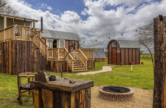 Oozing character and hidden surprises, Dixie is a repurposed horse box set in a wonderful wild flowe