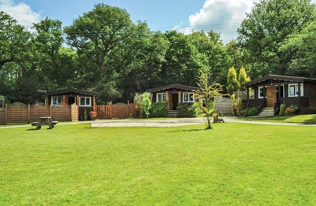 Open plan lodge with two doubles, both with TV/DVD.