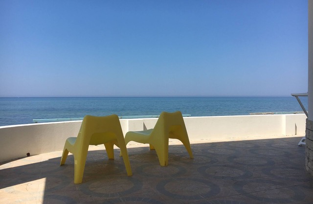 Panoramic house with veranda on the sea