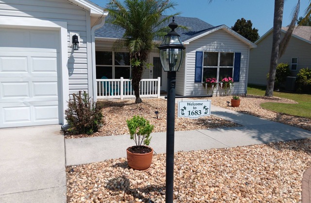 Paradise Village home in perfect golfing and recreation center location.