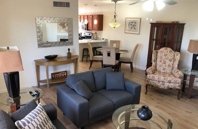 Perfect end unit condo with mountain views and upper level balcony/patio