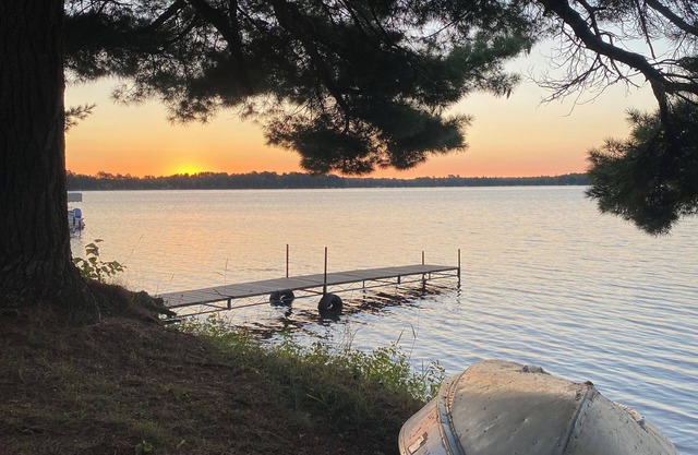 Perfect spot for your next stay: RV camper on quiet, wooded lake lot