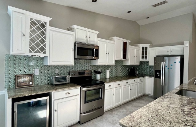 Pet-friendly 3-bed 2-bath house with pool, WiFi & open floor plan in Seffner