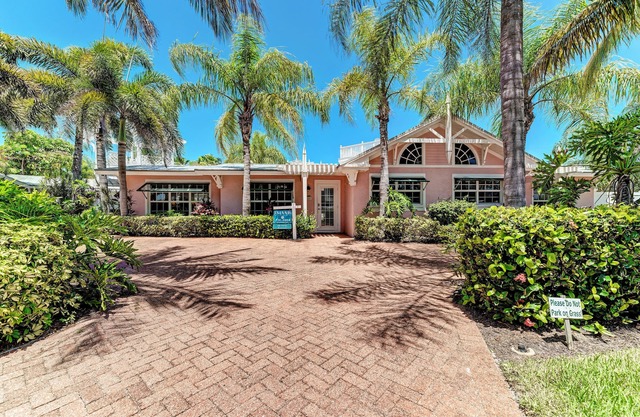 Pink Flamingo in Palm Isle Village - 2BR Condo with Pool - By Island Real Estate