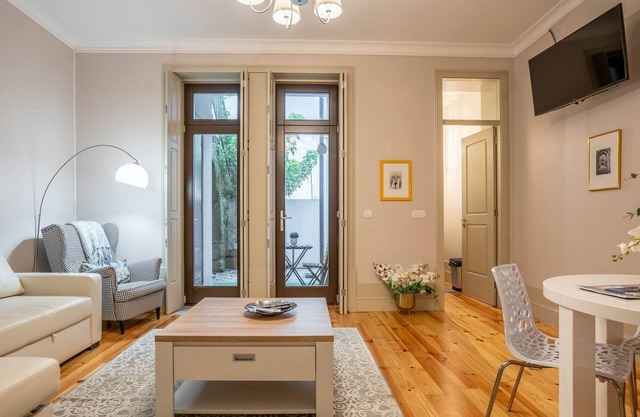 Porto Historic: 1BR w/Private Patio by LovelyStay