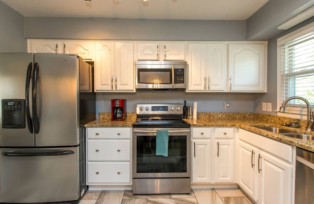 Prime Location: Ranch w/Basement, Covered Porch, & Great Yard!