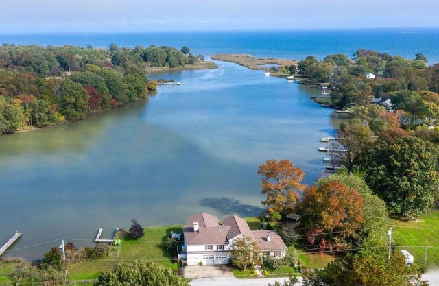 Pristine Waterfront Home with Expansive Views.