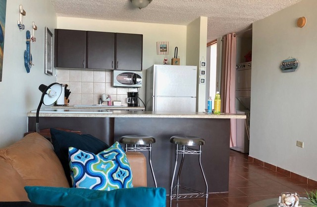 Private beachfront 1 bedroom condo, WiFi, full A/C.