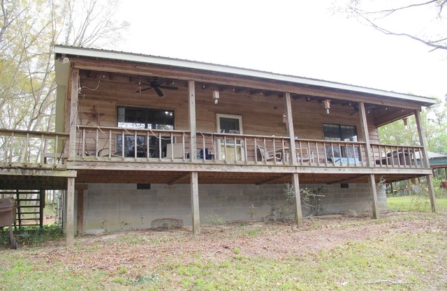 Private cabin on 5 acres near Troy, Alabama with pond.