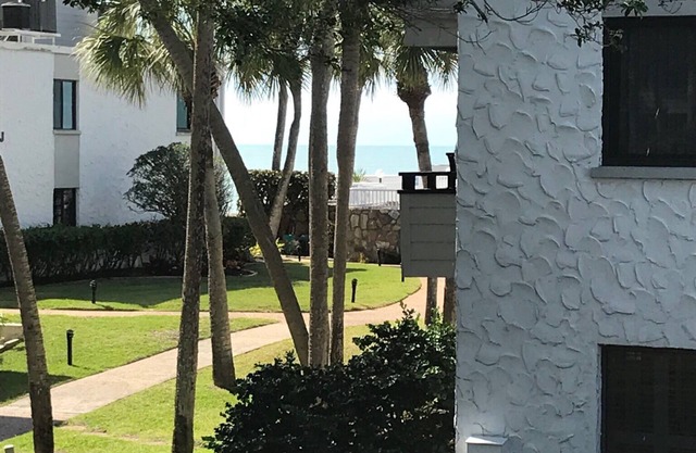 Private Lanai overlooking Beautiful Garden just 100 Feet to Pool, Deck and Beach