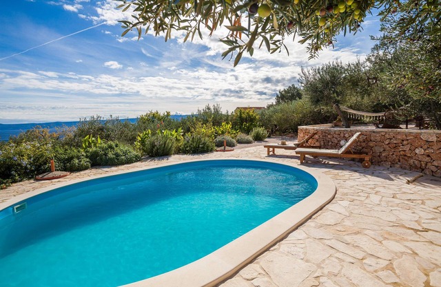 Private pool family home with open sea view